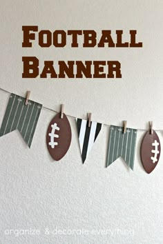 a football banner hanging on a wall with the words football banner in brown and white