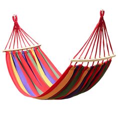 a multicolored hammock hanging on a white background with no one in it