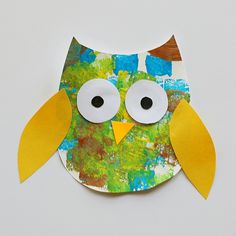 an owl made out of paper with googly eyes