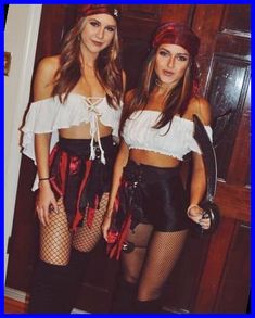 two beautiful young women standing next to each other in front of a wooden door wearing fishnet stockings