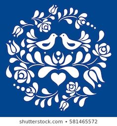 a blue background with white flowers and birds in the shape of a circle on it