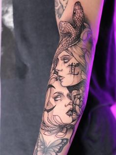 a woman's arm with tattoos on it and butterflies flying around her head in the air