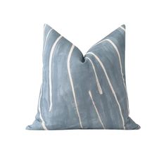 a blue pillow with white lines on it