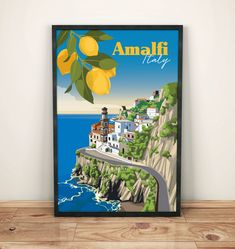 there is a poster with lemons hanging on the wall next to the ocean and an orange tree