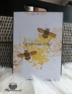 a card with some bees on it