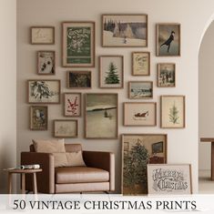 a living room filled with lots of framed pictures on the wall above a brown chair