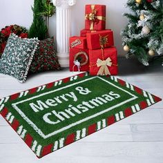 merry and christmas door mat with presents on the floor