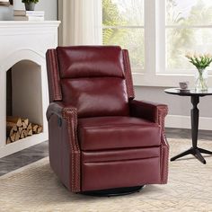 a red recliner chair sitting in front of a fireplace