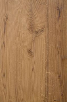 a close up view of the wood grains on a wooden flooring paneled wall