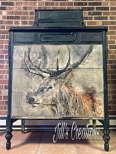 an image of a deer with antlers painted on it's chest, sitting in front of a brick wall