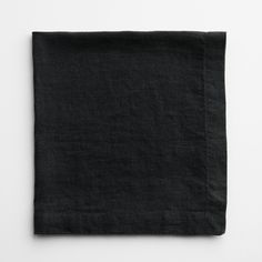 black linen napkin on white background