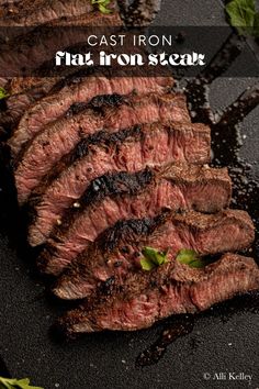 sliced steak with herbs and seasoning on the side