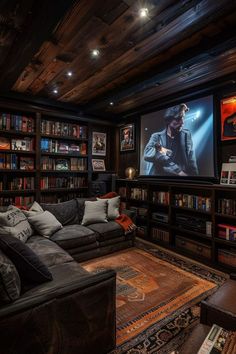 a living room filled with furniture and a flat screen tv mounted to the side of a wall