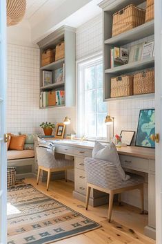 a home office with built - in shelving and desks, along with baskets on the shelves