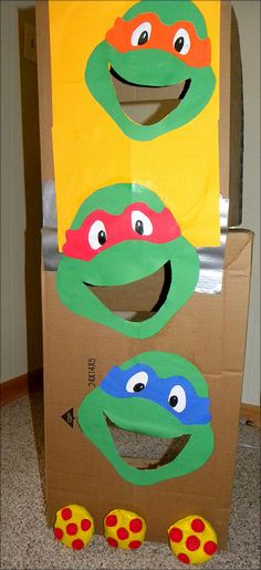 a cardboard box that has some teenaged turtles on it