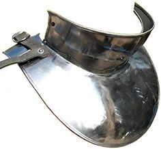 a metal helmet with a pair of scissors on it