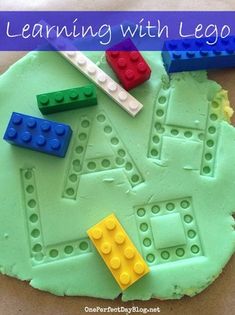 a close up of a cake with legos on it