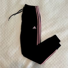 Best Selling Slim Fit Adidas Fleece Jogger Pants With Tapered Ankle. Features Pink 3 Stripe Design And Pink Logo On Front. Never Worn. Slim Joggers, Striped Sweatpants, Pink Logo, Fleece Joggers, Jogger Sweatpants, Black Adidas, Track Pants, Adidas Women, Jogger Pants