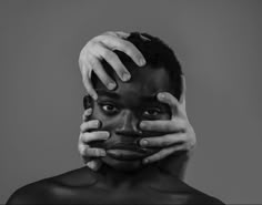 a woman covering her face with hands