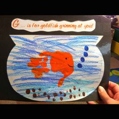 a child's drawing of a fish in a bowl