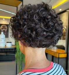Cute Tousled Curly Pixie with Straight Across Nape 