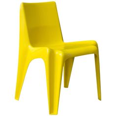 a yellow plastic chair on a white background