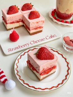 strawberry cheesecake cake with strawberries on the plate and other desserts in the background