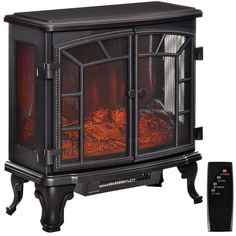 an electric fireplace heater sitting next to a remote control