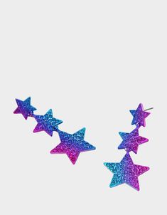 Vibrant linear earrings featuring graduated ombre stars adorned with sparkly pavé. Earrings have a post back closure. Made from metal, glass and plastic. Metal/Glass/Plastic Post back 2.25" L 0.9" W Imported Linear Earrings, Happy Hippie, Satchel Backpack, Miss Usa, Dress Flats, Blue Jewelry, Spring Trends, Flat Sneakers, Flower Child