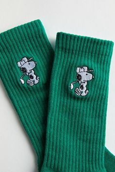 Snoopy embroidery crew socks. Everyday socks with a ribbed knit ankle cuff. Features Crew length socks Ribbed knit ankle cuff Embroidered Snoopy motif Content + Care Includes 1 pair 95% Cotton, 3% polyester, 2% spandex Machine wash Imported | Snoopy Golf Crew Sock in Green, Men's at Urban Outfitters Gifts For College Boys, Snoopy Embroidery, Aesthetic Socks, Socks Aesthetic, Work Socks, Guys Clothing Styles, Crew Sock, Cute Socks, Athletic Socks