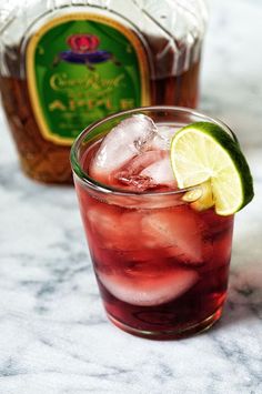 a close up of a drink in a glass on a table