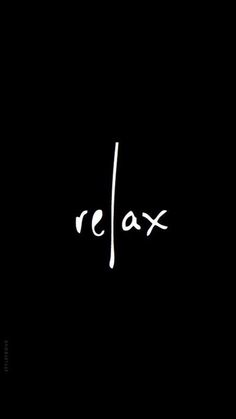 the word relax is written in white ink on a black background with an arrow pointing to it