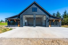 an open garage with two doors on the front