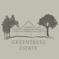 the logo for greentrees estate, which is located in an area with trees