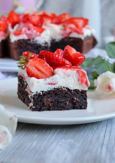 a piece of chocolate cake with strawberries on top