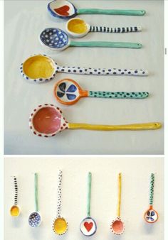 several spoons are lined up in different colors and designs, one has a heart on it