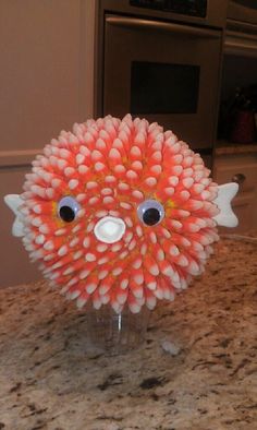 an orange and white object sitting on top of a counter