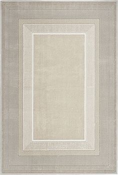 a white rug with a square design on it