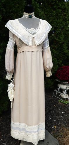 Antique 1910's cotton lace lady Edwardian dress color soft light peach/ecru，In good antique condition, Few stain in it, The pictures is part description. Not sure the size. It's 100% cotton . Weighs 12 Oz. Sale dress only.  Thanks. Collar part 14" long Shoulder: 14" Waist 26" long Bust: 37" long Sleeves 23" long Dress 55"1/2 long Historical Design Vintage Dress For Events, Regency Style Empire Waist Dress For Vintage Events, Regency Style Dresses For Vintage Events With Empire Waist, Regency Style Vintage White Formal Dresses, Historical Design Prairie Dress For Wedding, Cottagecore Cream Vintage Dress For Wedding, Wedding Prairie Dress With Historical Design, Regency Style Victorian Dress For Vintage Events, Beige Vintage Dress With Lace Trim