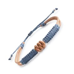 the blue and brown leather bracelet is shown with an adjustable cord, which has two different colored