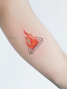 a tattoo with a triangle and fire on the left side of the arm is shown