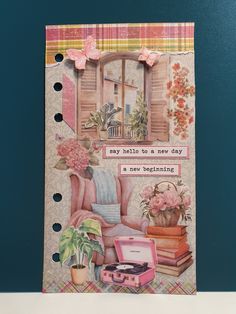 a greeting card with an image of a chair, potted plant and suitcase on it