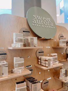 the shelves are filled with different types of soaps