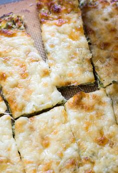 some food that is cut into squares on a table