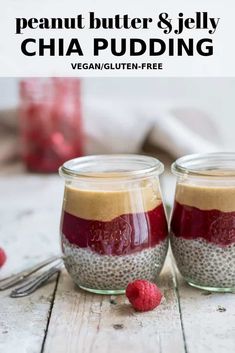 two jars filled with chia pudding next to raspberries on a wooden table