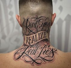 the back of a man's head with some words on his face and neck