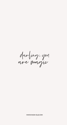 a black and white photo with the words daring you are magic written in cursive writing