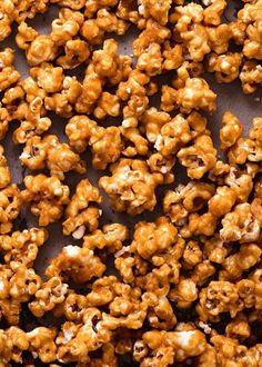 caramel popcorn kernels on a sheet of parchment paper