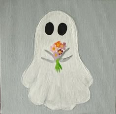 a white ghost with flowers on it's nose is painted on a gray background