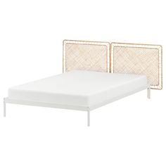 an image of a bed with two headboards and a mattress on top of it